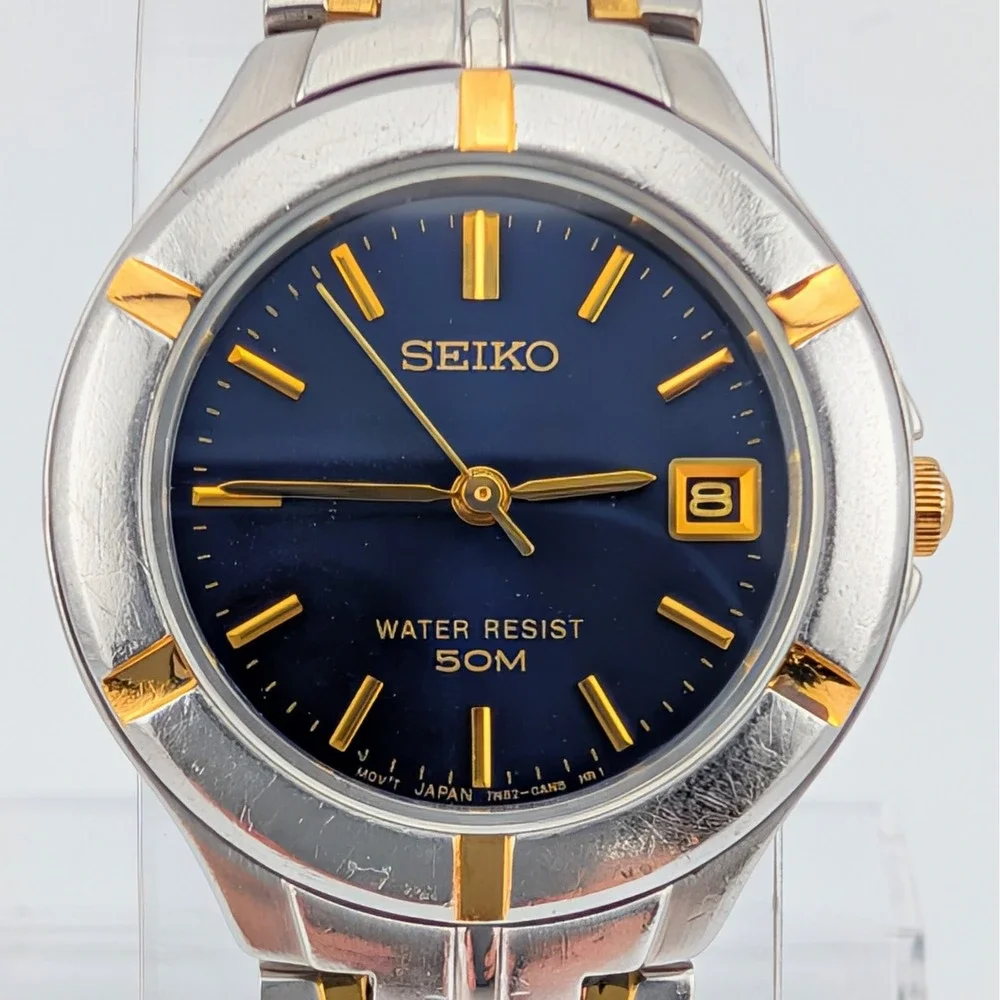 Seiko 7N82-0AG0 Blue Sunburst Two Tone Date Quartz Watch 50M‎